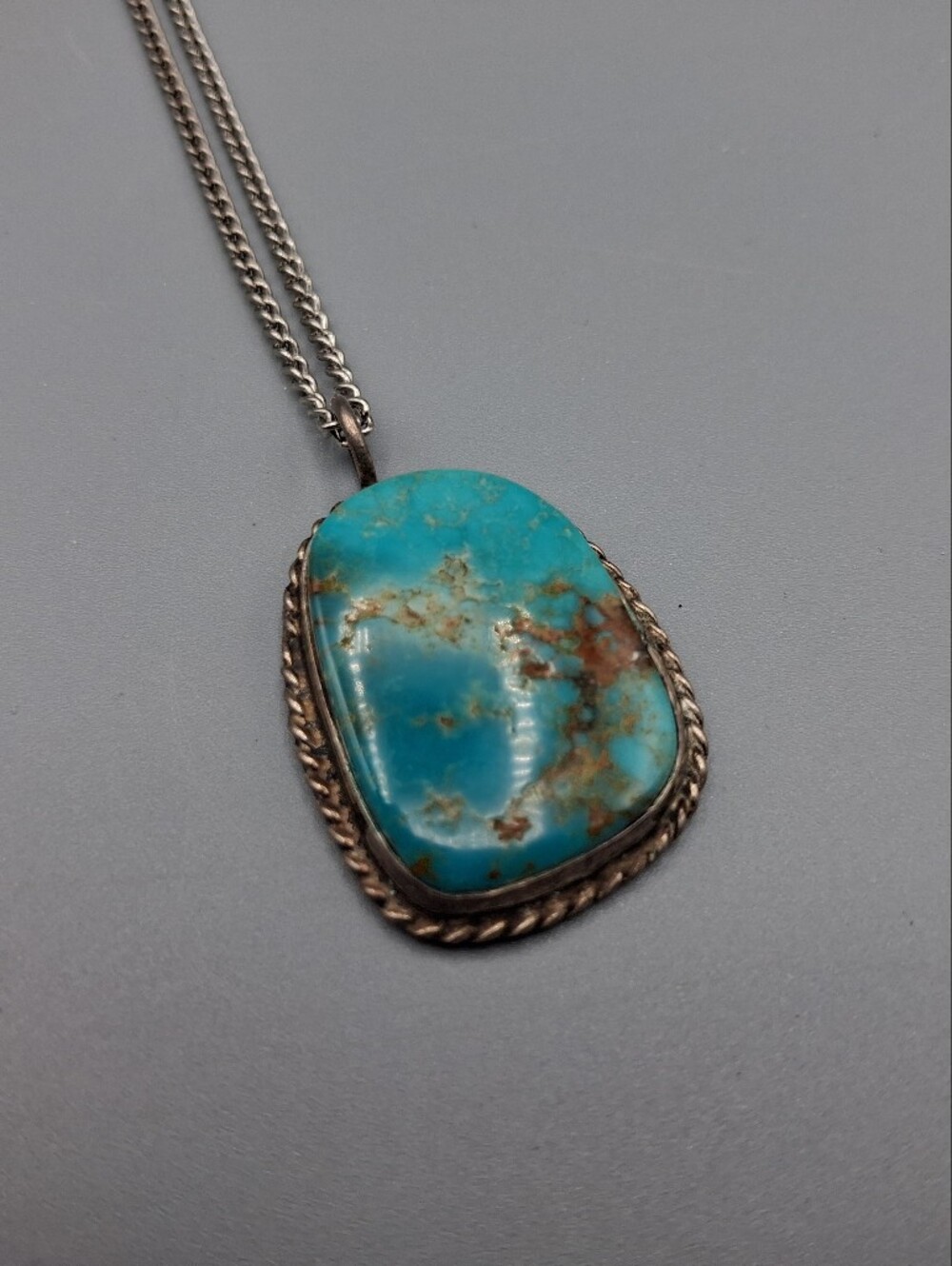 Unmarked Native American Turquoise and Silver Pendant w/ Twisted Border on Chain